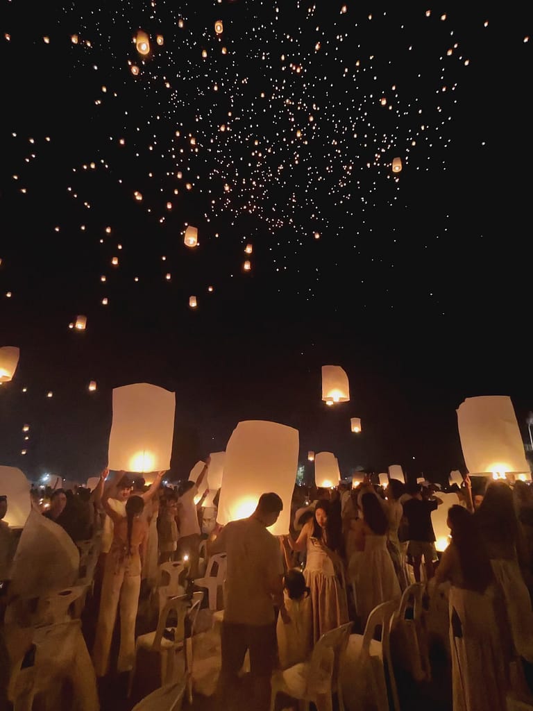 People releasing lanterns at the Thailand lantern festival